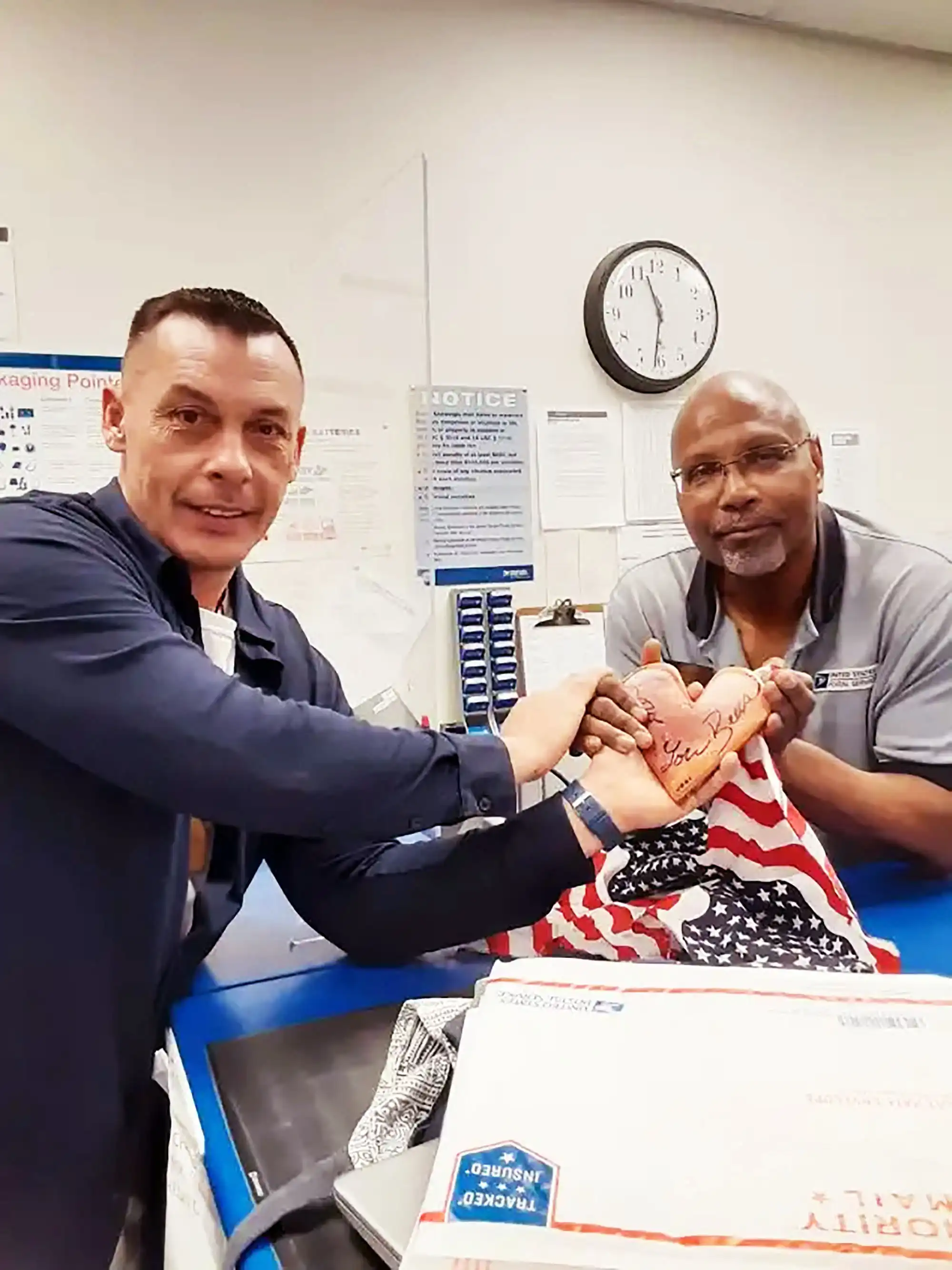 Author David Haave sends out a heart at the US Post office with fellow US Army Veteran, St. Robert, MO, USA. -- David Haave
